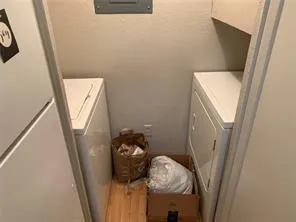 view of a room with door window and hardwood floor