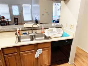 806 West 24th Street, Unit 229 Austin, TX 78705 - Photo 12 of 23 a bathroom with a sink and a mirror