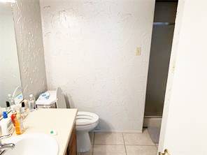 806 West 24th Street, Unit 229 Austin, TX 78705 - Photo 16 of 23 a bathroom with a sink and a toilet