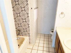 806 West 24th Street, Unit 229 Austin, TX 78705 - Photo 20 of 23 a bathroom with a bathtub and shower