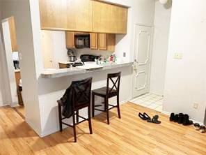 806 West 24th Street, Unit 229 Austin, TX 78705 - Photo 6 of 23 a dinning room with table and chairs