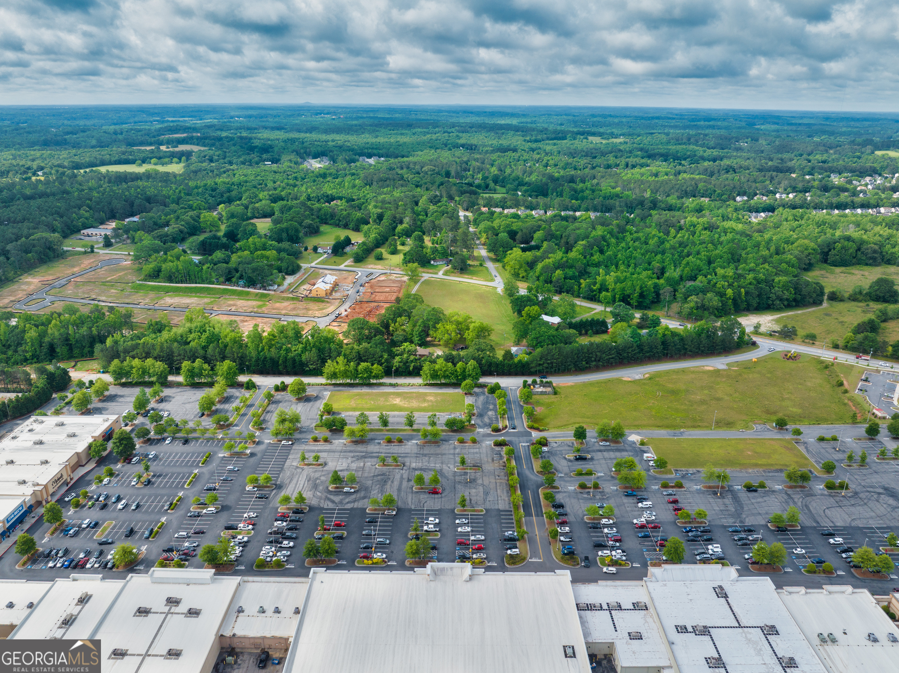 449-455 Carl Bethlehem Road Bethlehem, GA 30620 - Photo 13 of 15 an aerial view of a house with a garden