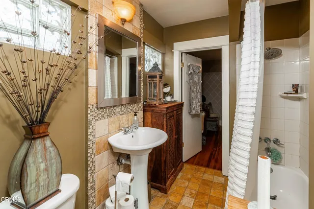 a view of a chairs and table in the patio