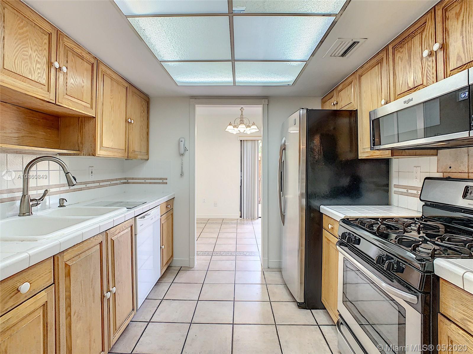 11499 Southwest 109th Road, Unit 9B Miami, FL 33176 - Photo 14 of 47 Kitchen full view