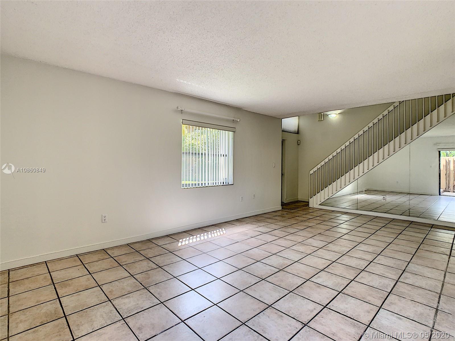 11499 Southwest 109th Road, Unit 9B Miami, FL 33176 - Photo 8 of 47 Entrance & Living room