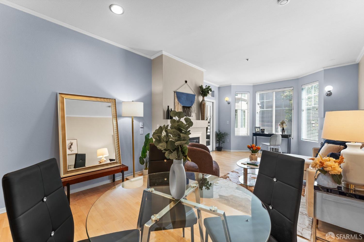 280 Caldecott Lane, Unit 101 Oakland, CA 94618 - Photo 12 of 32 a living room with furniture and a window