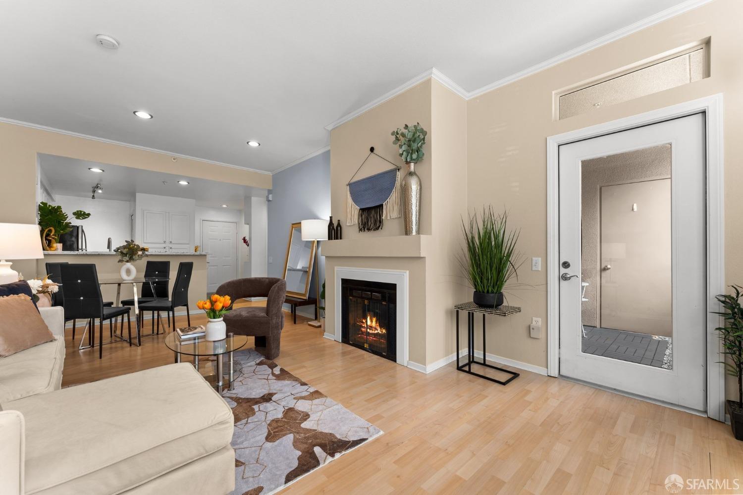 280 Caldecott Lane, Unit 101 Oakland, CA 94618 - Photo 15 of 32 a living room with furniture and a fireplace
