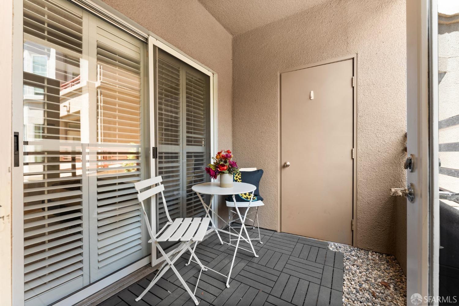 280 Caldecott Lane, Unit 101 Oakland, CA 94618 - Photo 17 of 32 a view of a room with furniture and wooden floor