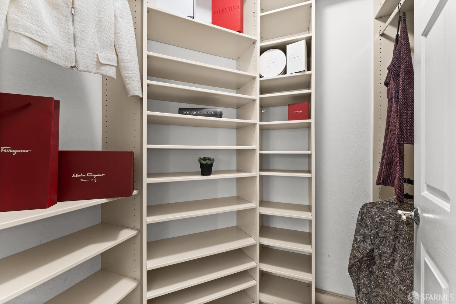 280 Caldecott Lane, Unit 101 Oakland, CA 94618 - Photo 22 of 32 a view of walk in closet with empty racks