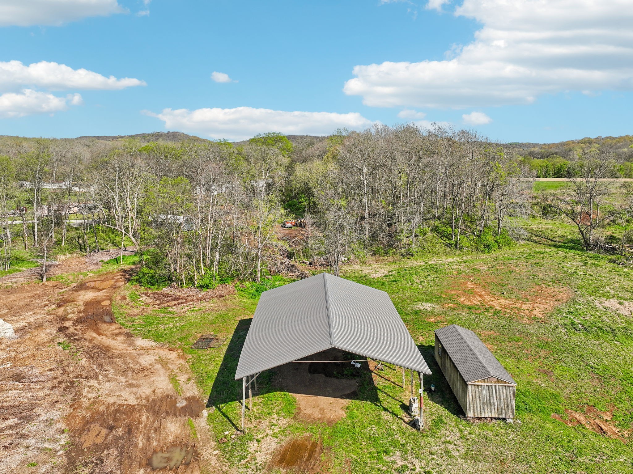 7919 Golf Club Road Mount Pleasant, TN 38474 - Photo 4 of 16 a view of a yard in front of a house