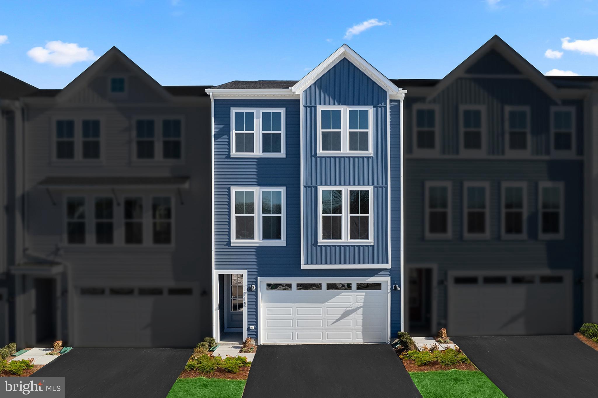 115 Galaxy Place Stephenson, VA 22656 - Photo 2 of 19 a front view of a residential apartment building with a yard
