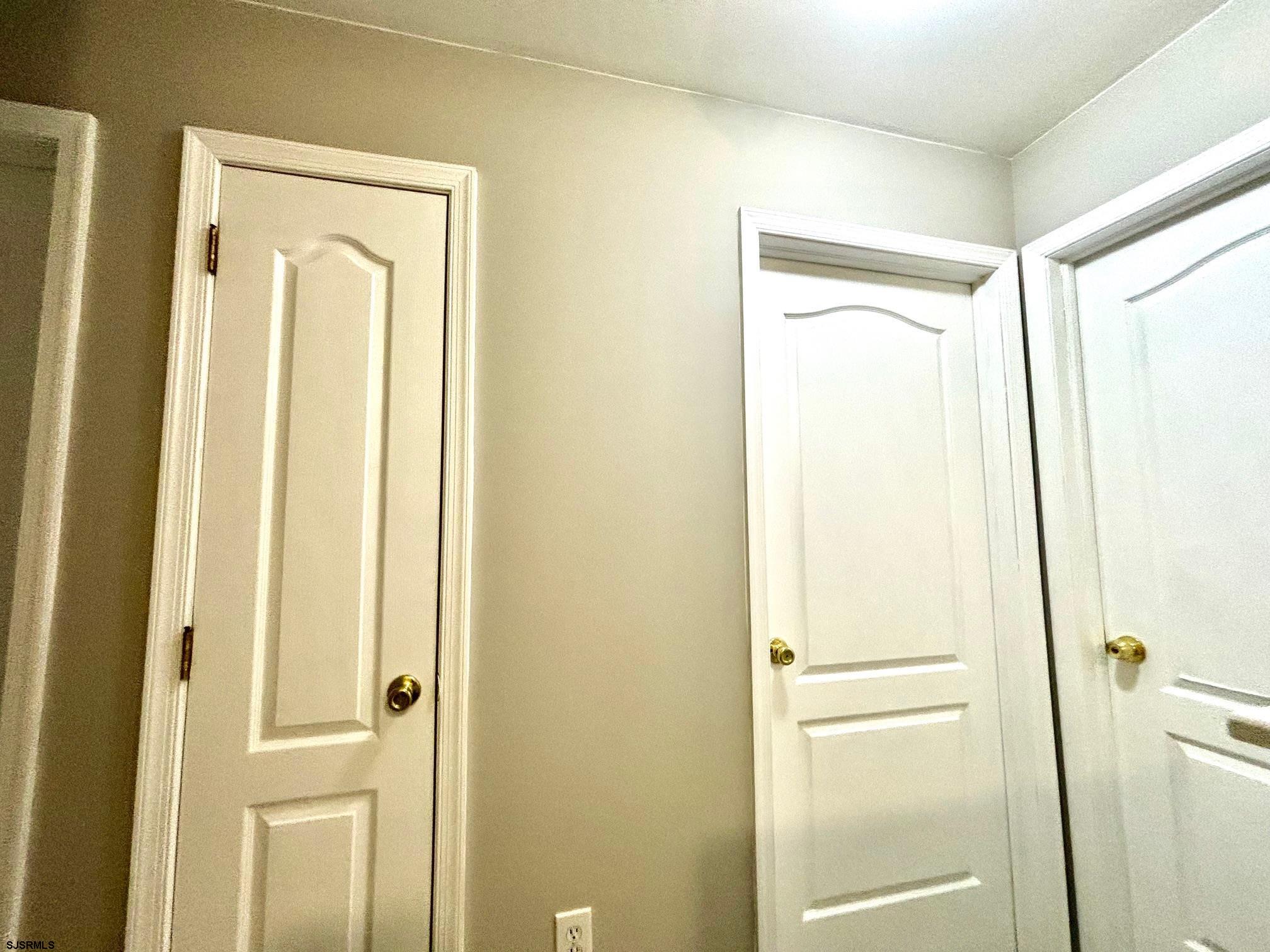 27 Oyster Bay, Unit G Absecon, NJ 08201 - Photo 17 of 31 a view of a front door