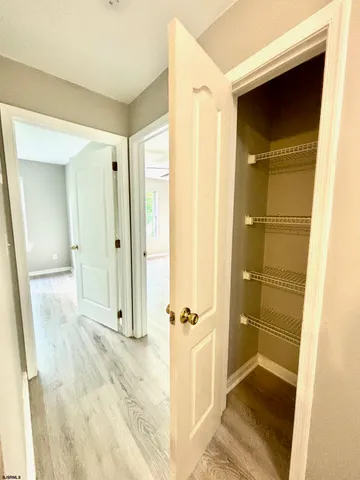 a view of a bathroom with a glass door