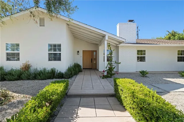 front view of a house with a street