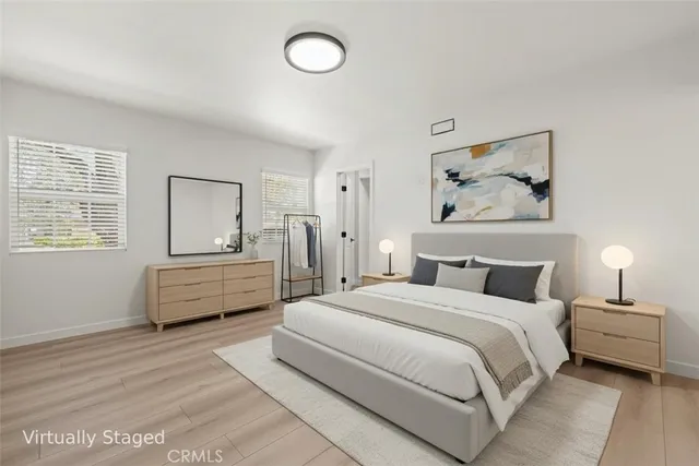 a white bath tub sitting next to a shower