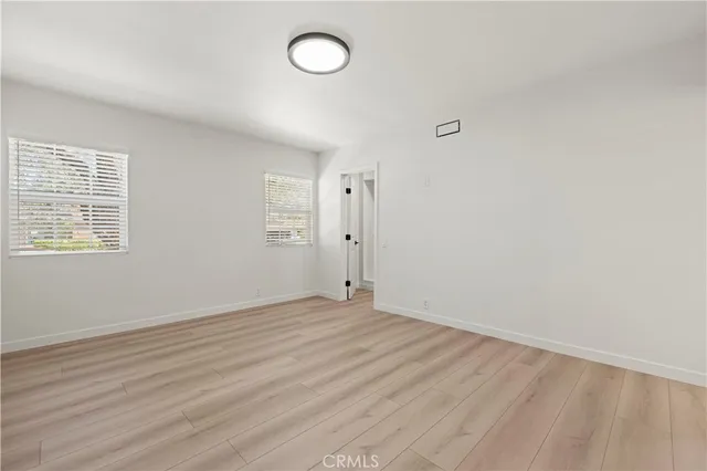 a bath tub sitting next to a shower