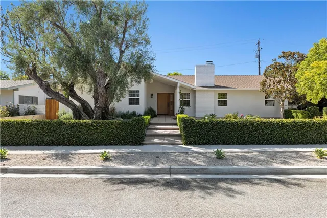 a backyard of a multi story tree
