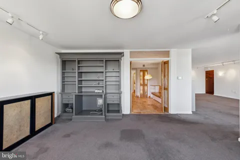 a view of balcony with furniture