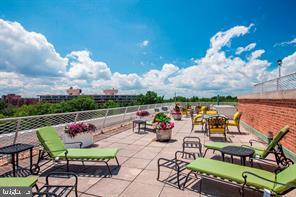 4301 Massachusetts Avenue Northwest, Unit 6007 Washington, DC 20016 - Photo 15 of 24 an outdoor sitting area with furniture and garden