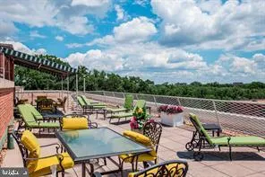 a view of a kitchen with cabinets