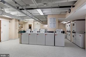 4301 Massachusetts Avenue Northwest, Unit 6007 Washington, DC 20016 - Photo 17 of 24 a view of a kitchen with cabinets