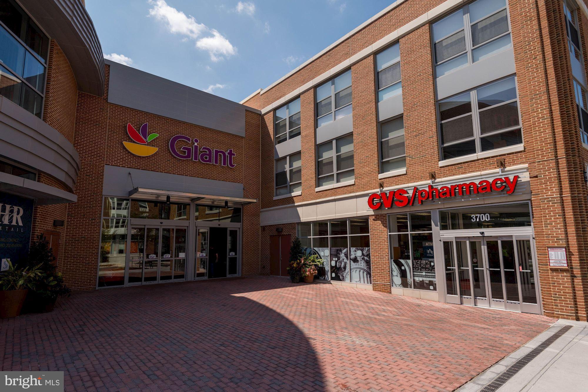 4301 Massachusetts Avenue Northwest, Unit 6007 Washington, DC 20016 - Photo 20 of 24 a front view of a building with street