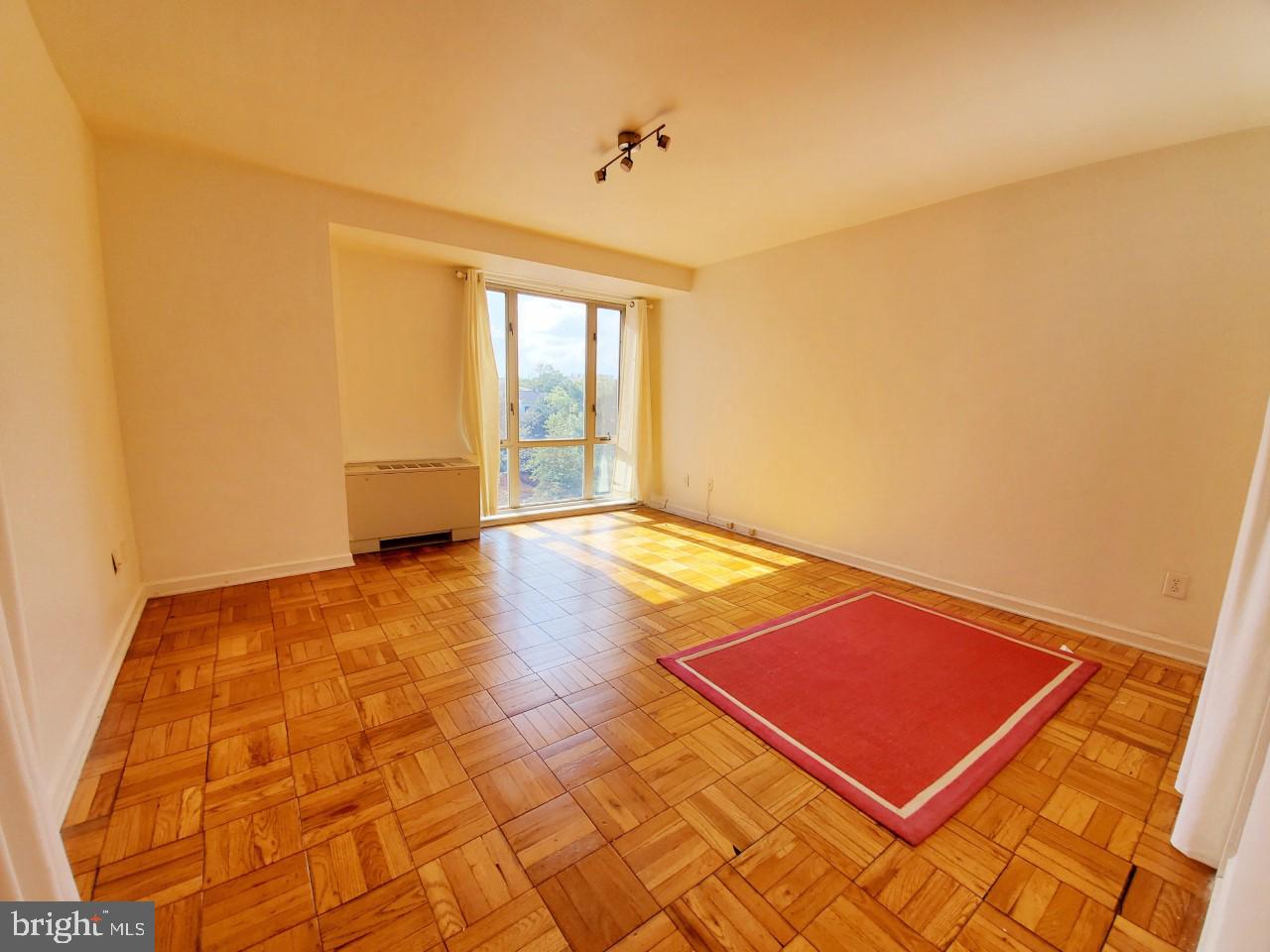 4301 Massachusetts Avenue Northwest, Unit 6007 Washington, DC 20016 - Photo 10 of 24 an empty room with a window