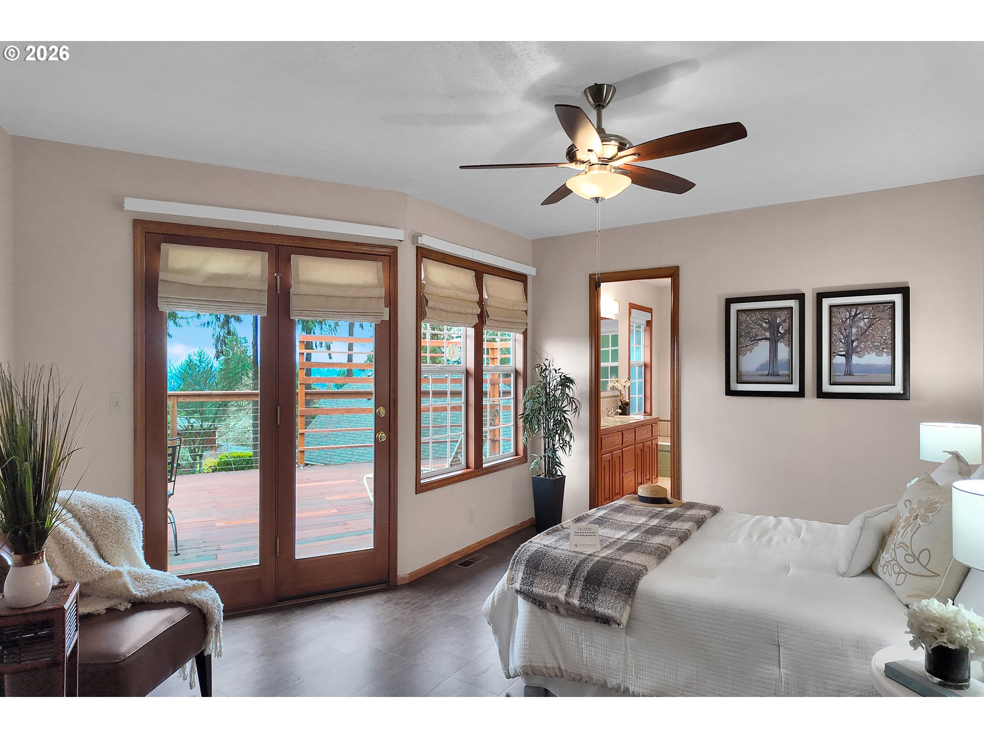 3023 Ashley Loop Eugene, OR 97405 - Photo 18 of 48 a bedroom with a large bed and a large window