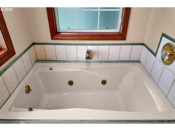 a utility room with washer and dryer