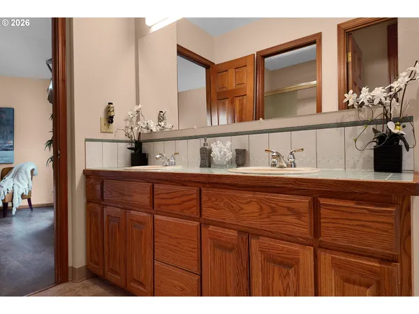 a kitchen with cabinets and window