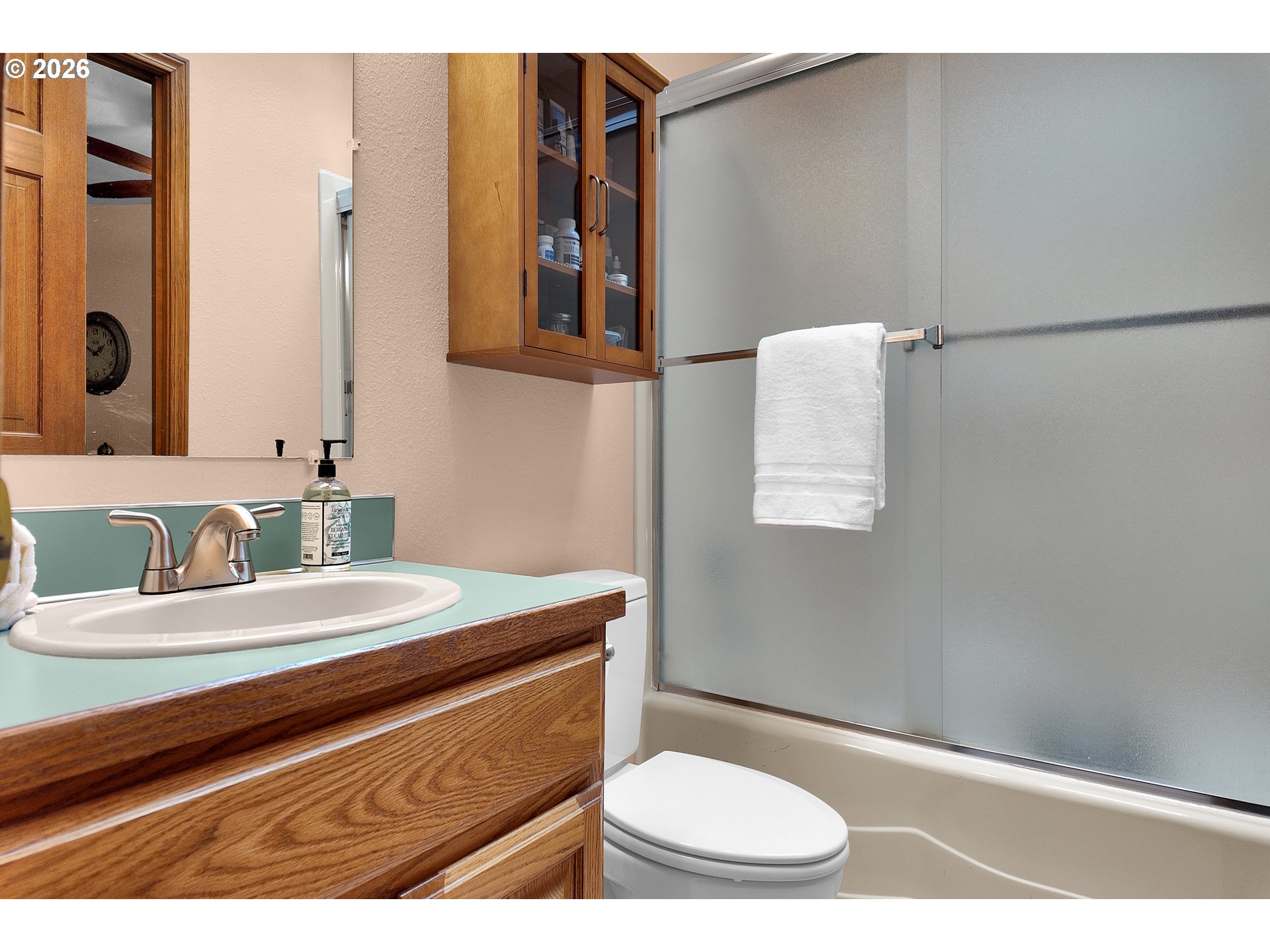 3023 Ashley Loop Eugene, OR 97405 - Photo 25 of 48 a bathroom with a sink a toilet and mirror