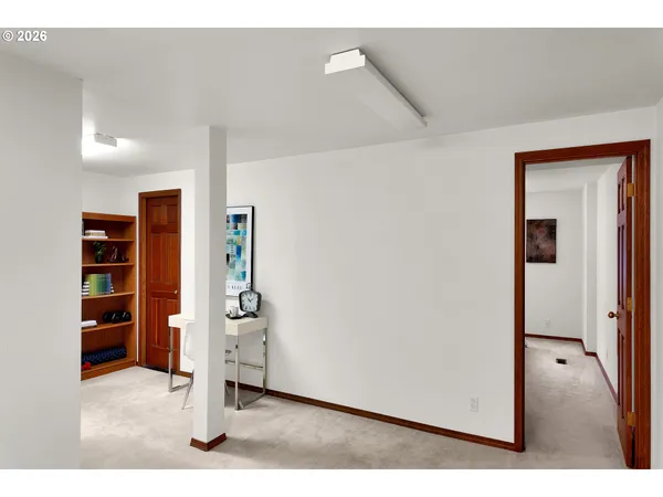 a view of room with furniture and a window