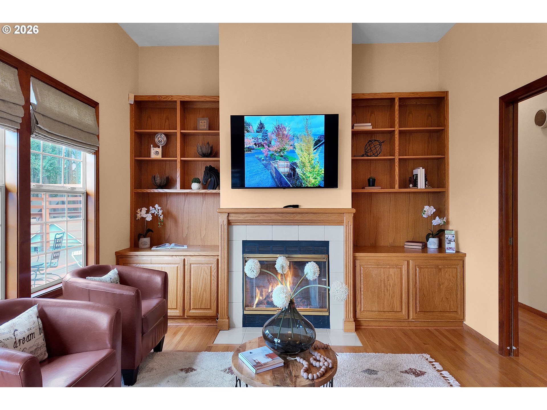 3023 Ashley Loop Eugene, OR 97405 - Photo 6 of 48 a living room with furniture a rug and a fireplace