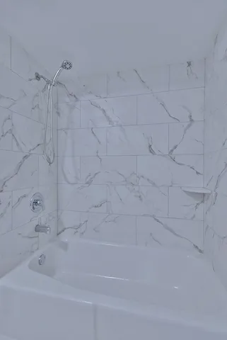 a bathroom with a bathtub