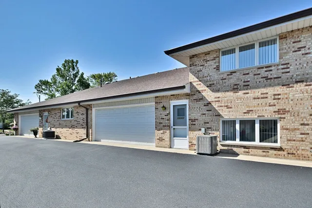 a view of a car garage of the house
