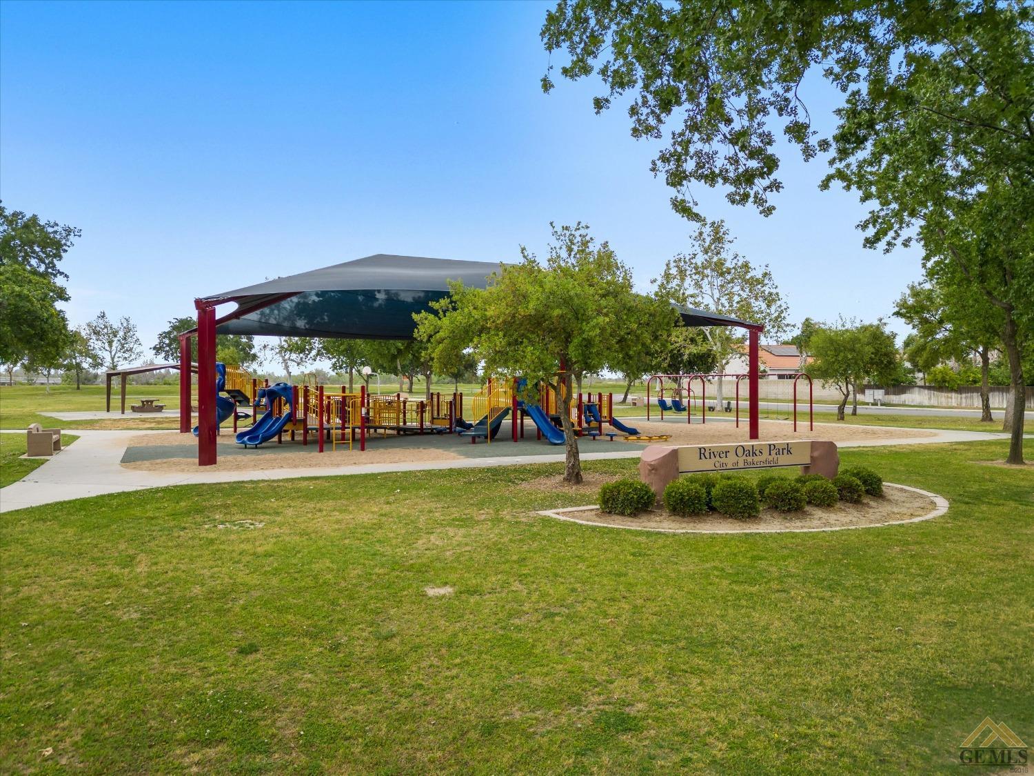 Undisclosed Address Bakersfield, CA 93311 - Photo 11 of 57 a view of a park with swings and slides