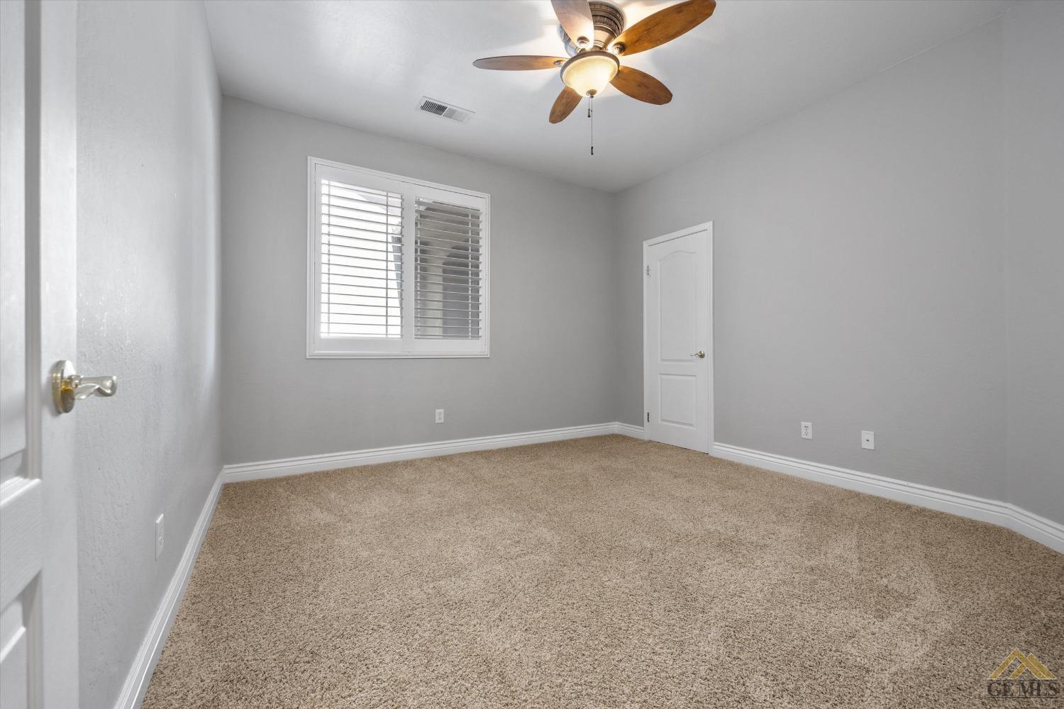 Undisclosed Address Bakersfield, CA 93311 - Photo 43 of 57 a view of an empty room with a window
