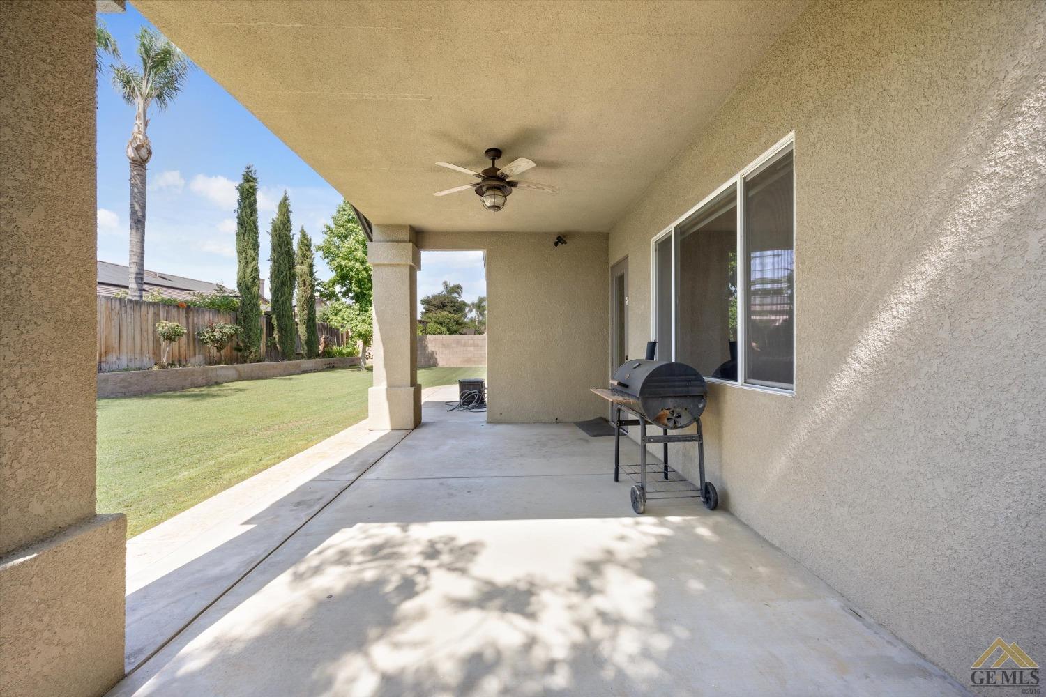 Undisclosed Address Bakersfield, CA 93311 - Photo 52 of 57 a view of living room with furniture and a large window