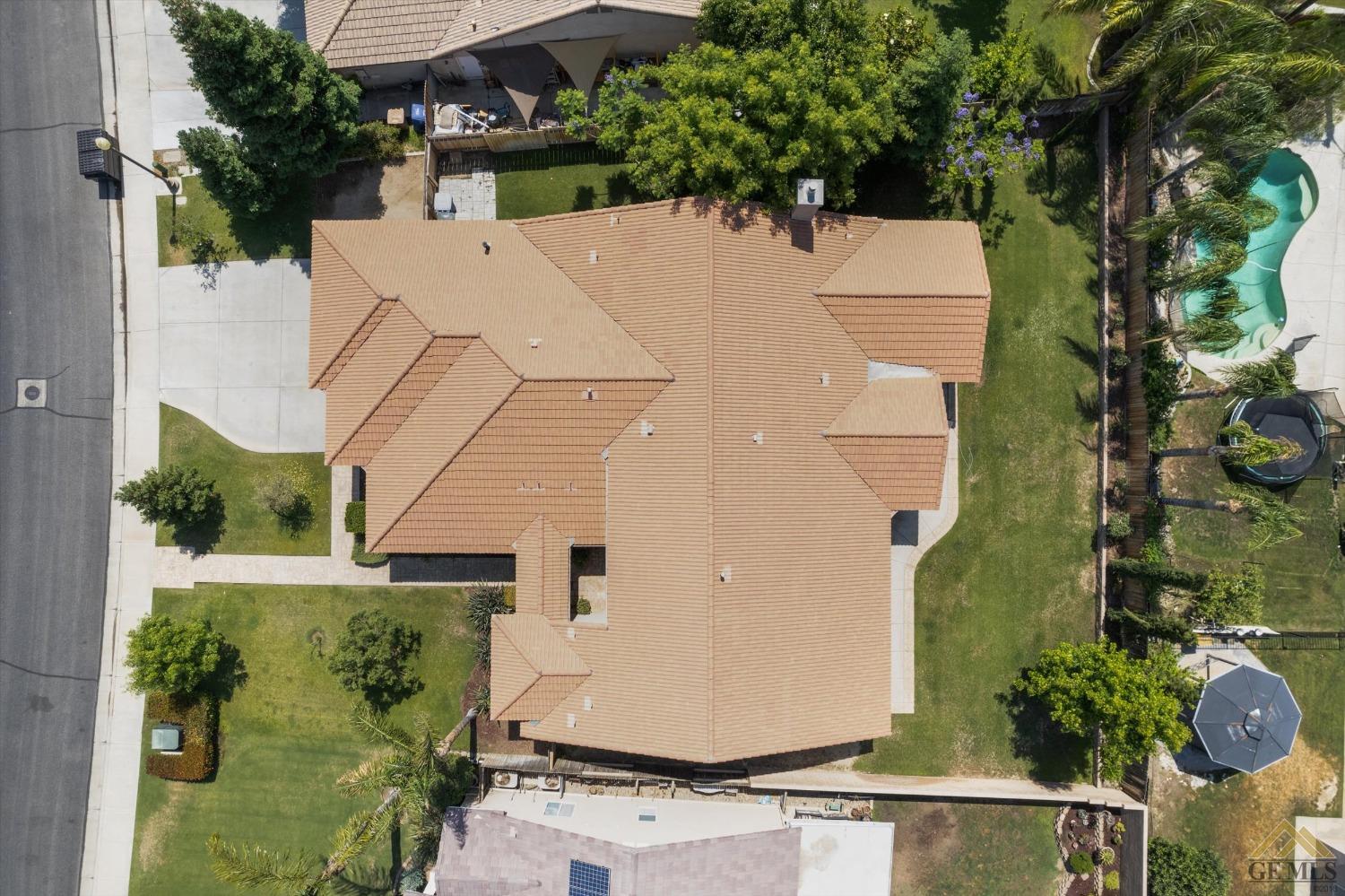 Undisclosed Address Bakersfield, CA 93311 - Photo 56 of 57 an aerial view of a house with a garden