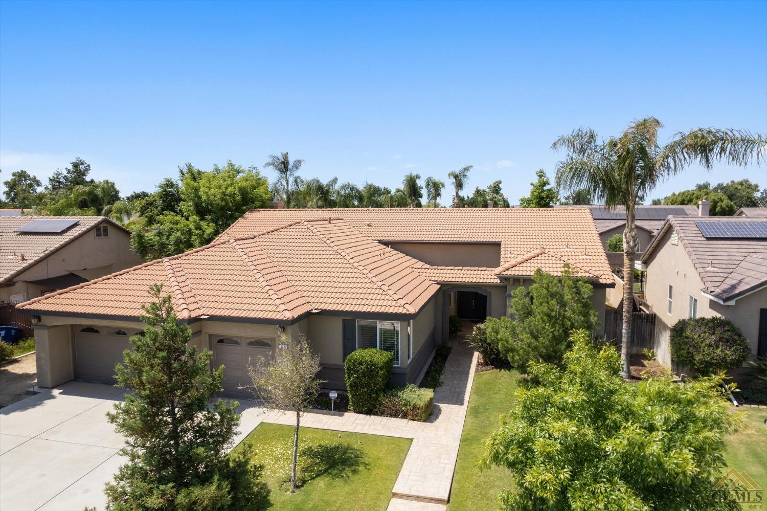 Undisclosed Address Bakersfield, CA 93311 - Photo 7 of 57 an aerial view of a house