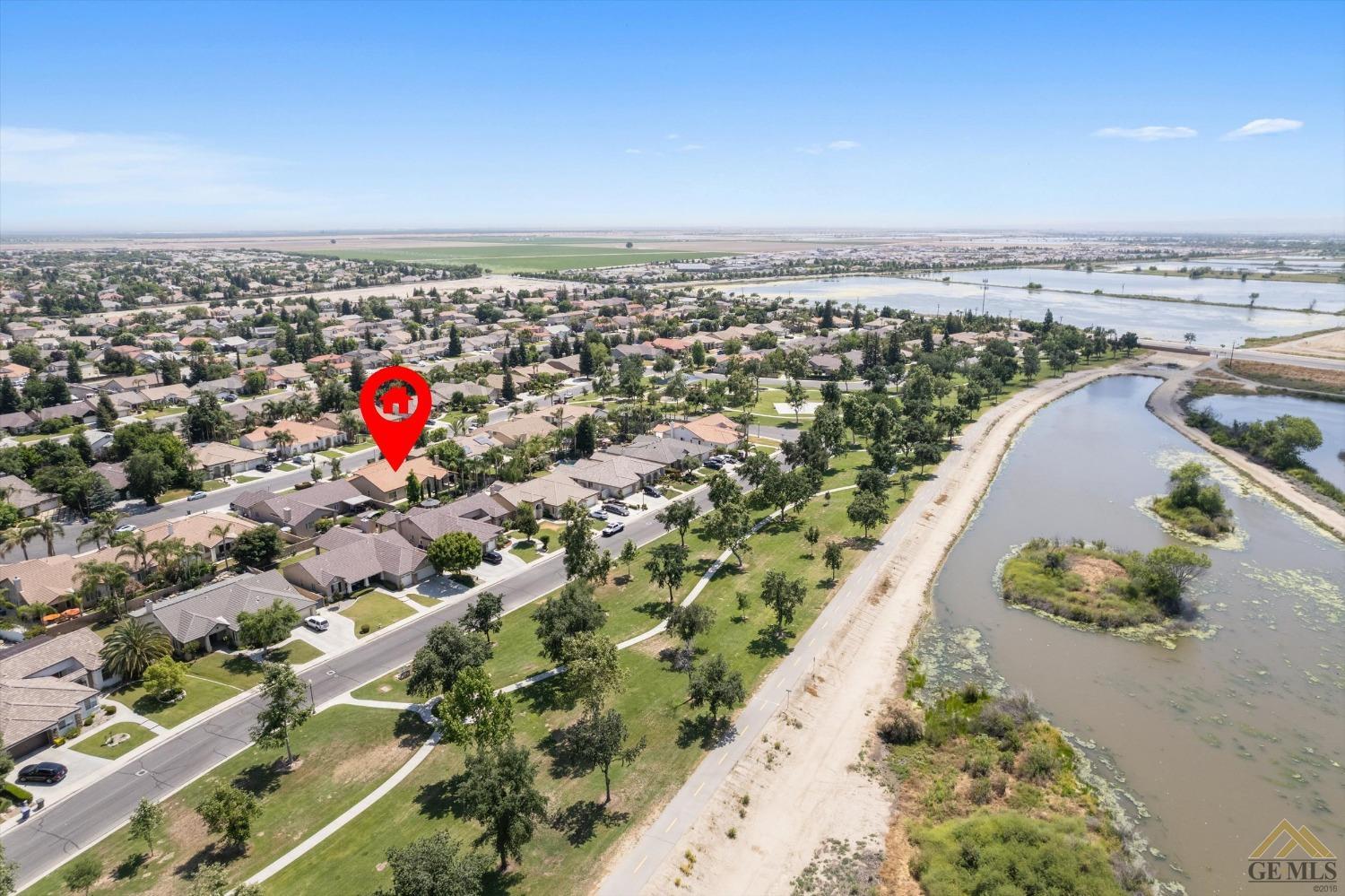Undisclosed Address Bakersfield, CA 93311 - Photo 8 of 57 an aerial view of a houses