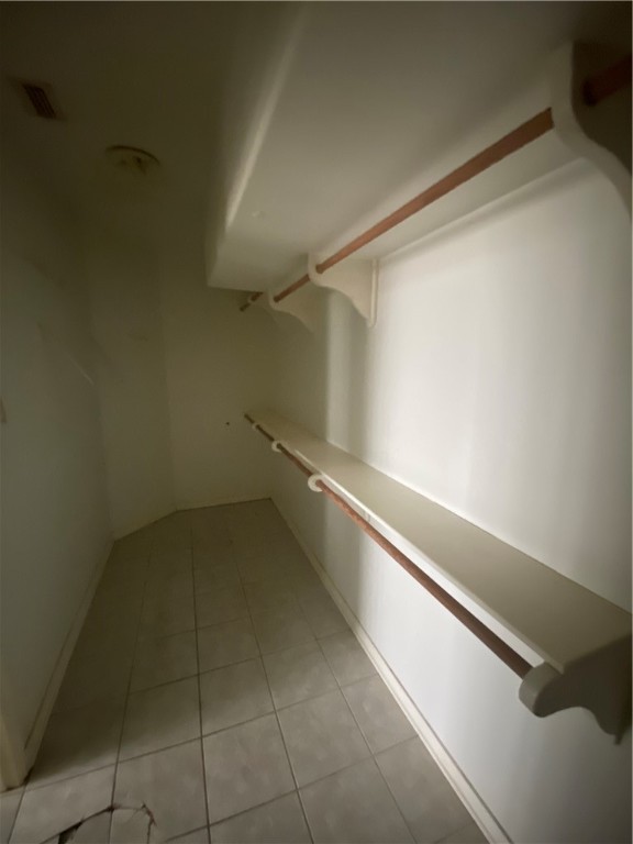 527 County Road 137 Alice, TX 78332 - Photo 13 of 32 a view of a room with racks on the wall