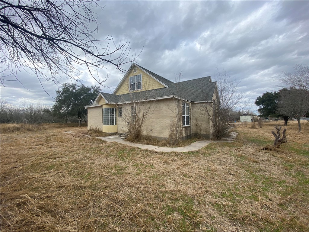 527 County Road 137 Alice, TX 78332 - Photo 25 of 32 a view of a house with a yard