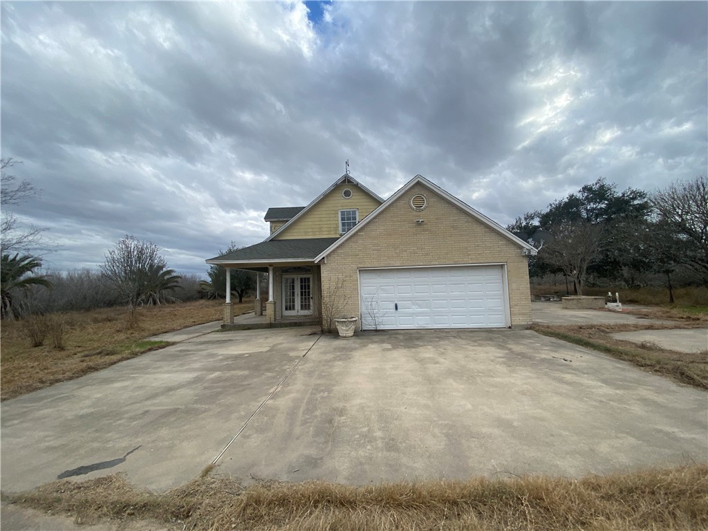 527 County Road 137 Alice, TX 78332 - Photo 28 of 32 a view of a house with a yard