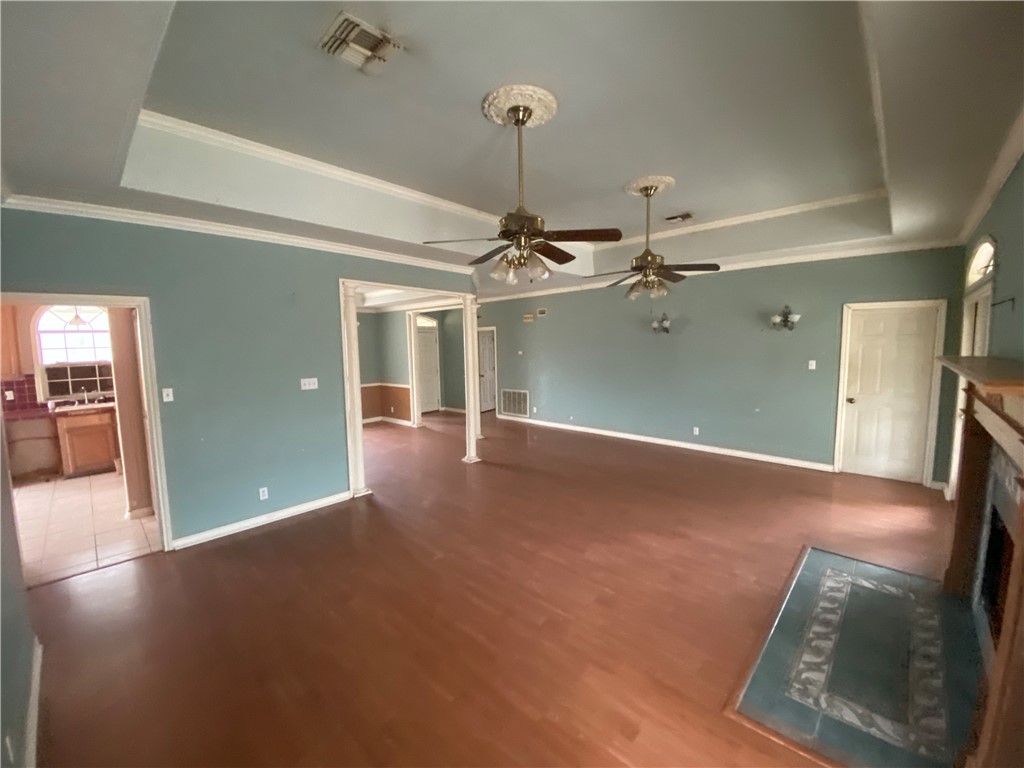527 County Road 137 Alice, TX 78332 - Photo 7 of 32 wooden floor in an empty room with a window