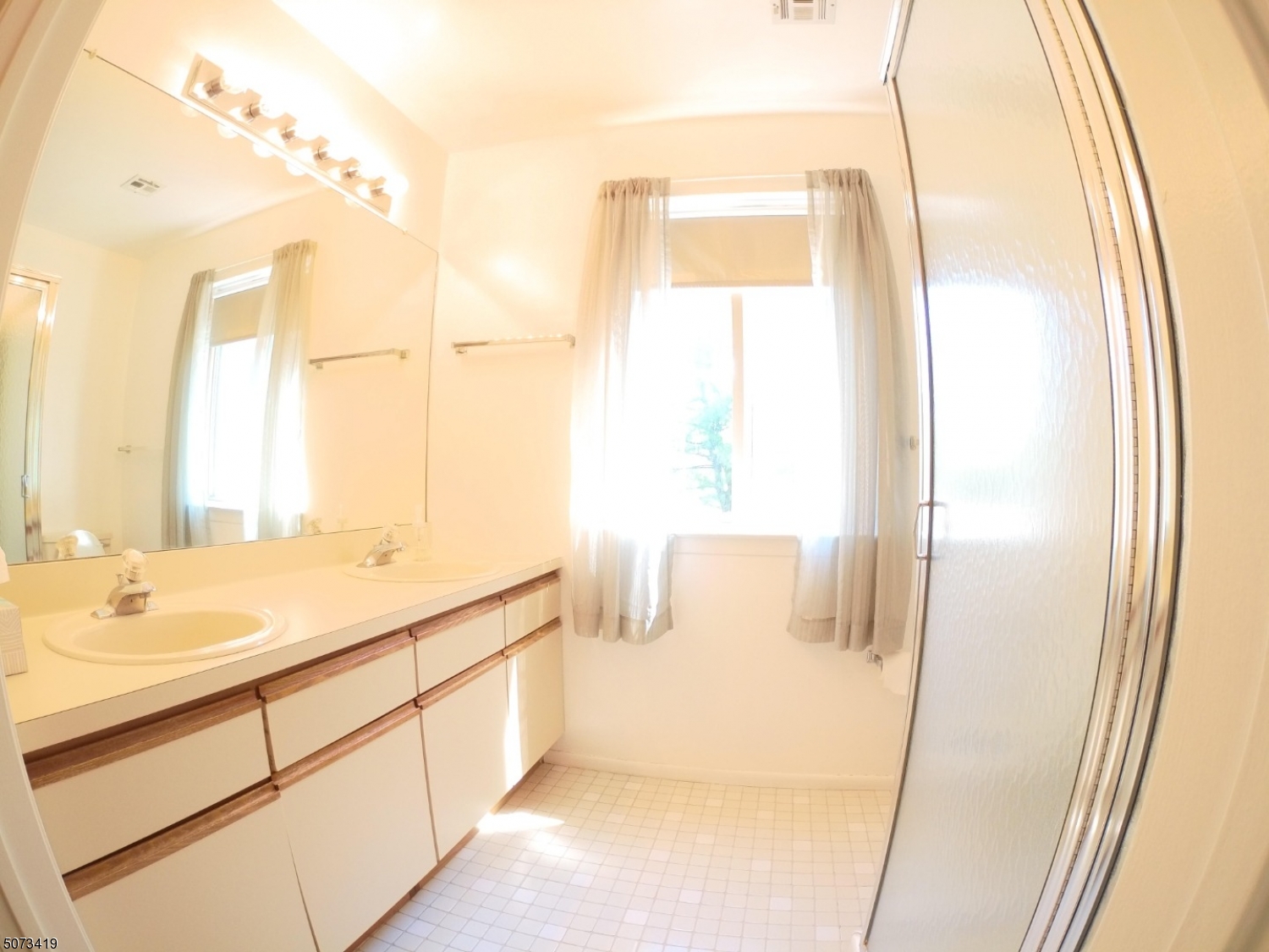 7 Drake Lane Ledgewood, NJ 07852 - Photo 12 of 12 a bathroom with a double vanity sink and a mirror