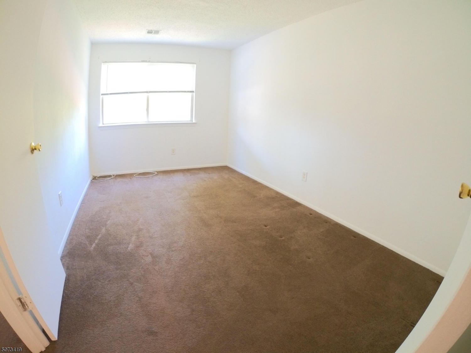 7 Drake Lane Ledgewood, NJ 07852 - Photo 6 of 12 an empty room with a window