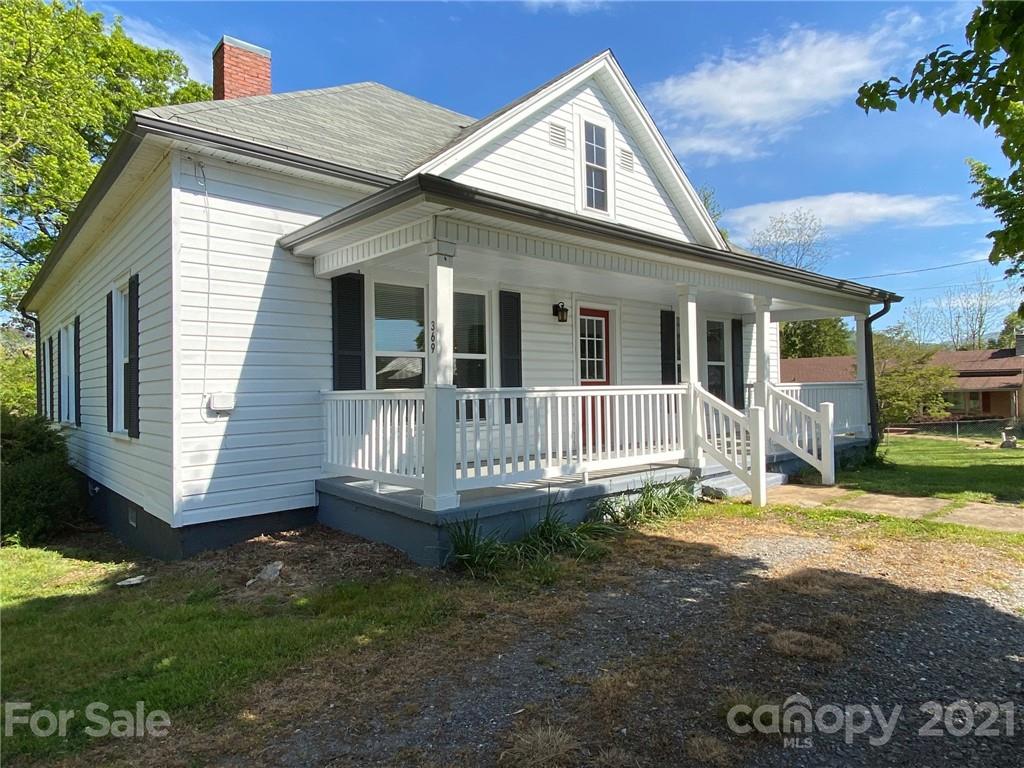 369 North Canton Road Canton, NC 28716 - Photo 1 of 21 a view of a house with a yard