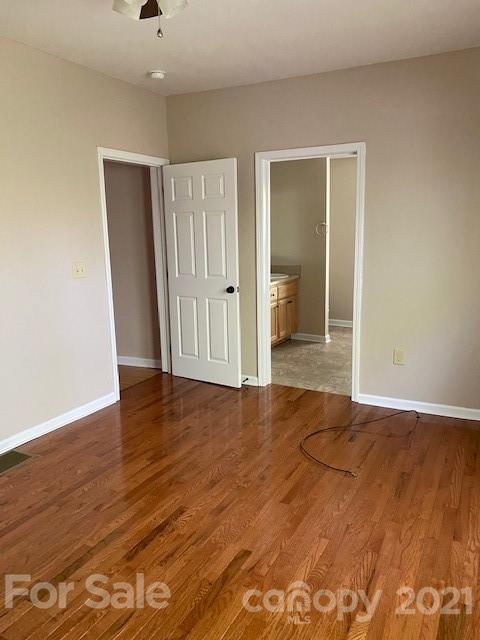 369 North Canton Road Canton, NC 28716 - Photo 12 of 21 wooden floor in an empty room