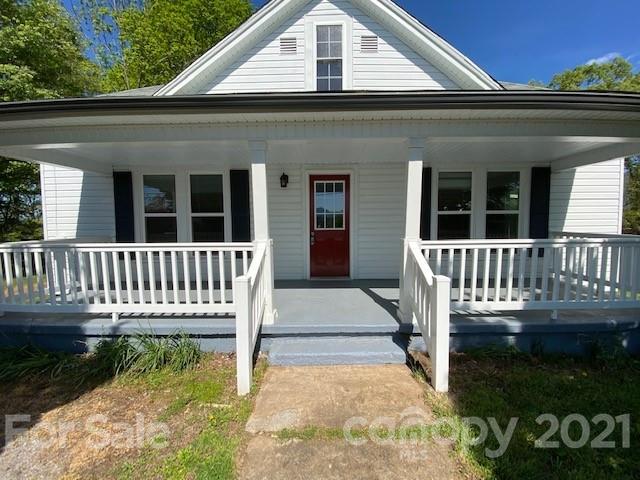 369 North Canton Road Canton, NC 28716 - Photo 4 of 21 front view of a house with a porch